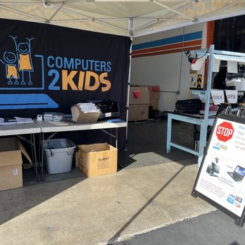 The Computers 2 Kids donation drop-off and distribution booth